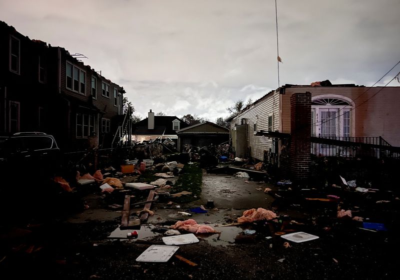 © Reuters. Debris is strewn across the ground in the Arabi neighborhood after a large tornado struck New Orleans, Louisiana, U.S. March 22, 2022. REUTERS/Kathleen Flynn