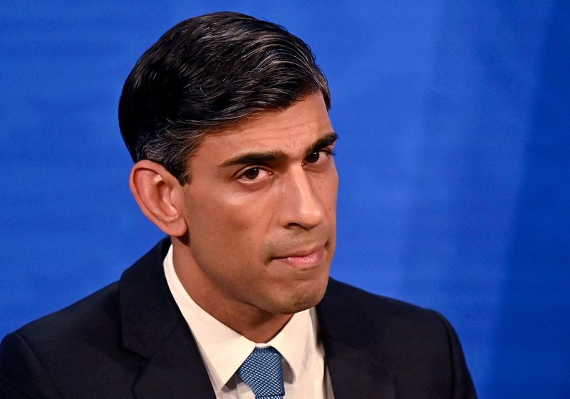 © Reuters. FILE PHOTO: Britain's Chancellor of the Exchequer Rishi Sunak hosts a news conference in the Downing Street Briefing Room in London, Britain February 3, 2022. Justin Tallis/Pool via REUTERS//File Photo