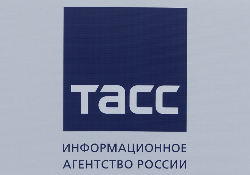 © Reuters. FILE PHOTO: The logo of Russian news agency TASS is seen on a board at the St. Petersburg International Economic Forum 2017 (SPIEF 2017) in St. Petersburg, Russia, June 1, 2017. REUTERS/Sergei Karpukhin/File Photo