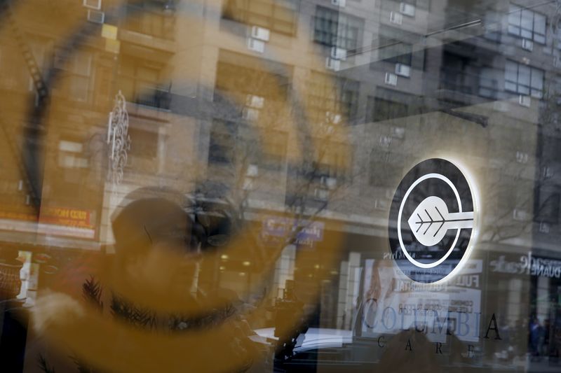 &copy; Reuters. The logo for the Columbia Care marijuana dispensary is seen though a window outside the clinic in New York January 7, 2016.  REUTERS/Shannon Stapleton