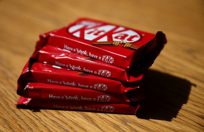 &copy; Reuters. Packets of Kit Kat chocolate covered wafer bars manufactured by Nestle are seen in London, Britain, July 25, 2018. REUTERS/Hannah McKay/Photo Illustration
