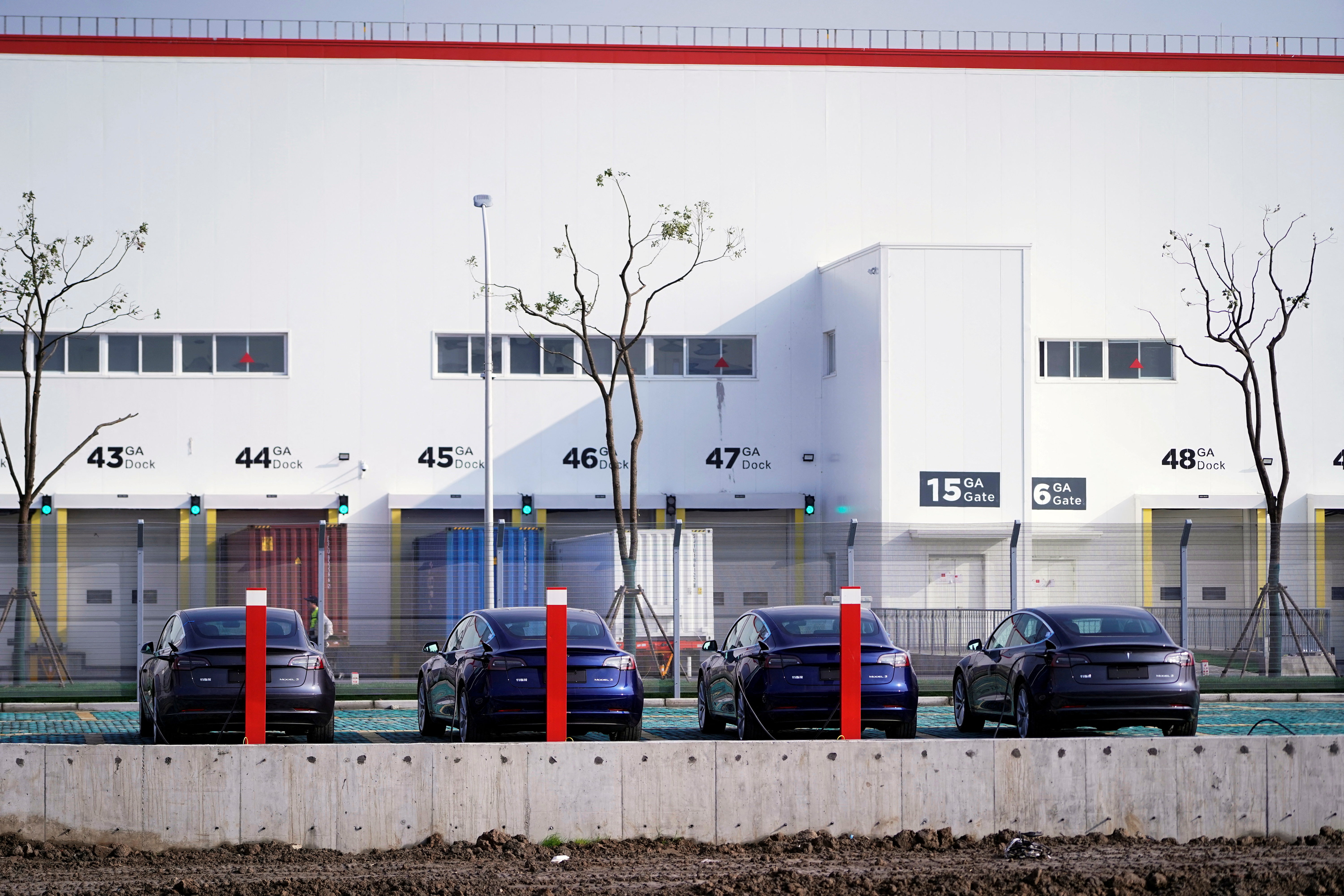 &copy; Reuters. FILE PHOTO: China-made Tesla Model 3 electric vehicles are seen at the Gigafactory of electric carmaker Tesla Inc in Shanghai,  China December 2, 2019. REUTERS/Aly Song