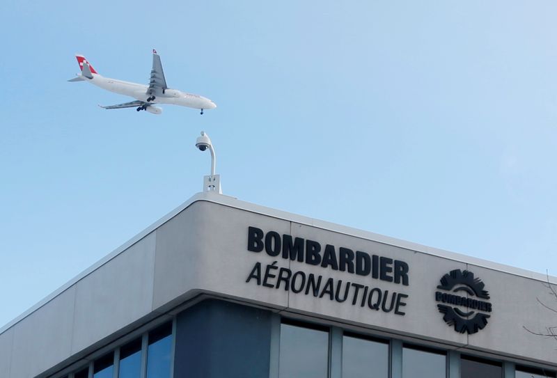 &copy; Reuters. FILE PHOTO: A plane flies over a Bombardier plant in Montreal, Quebec, Canada on January 21, 2014.   REUTERS/Christinne Muschi/File Photo