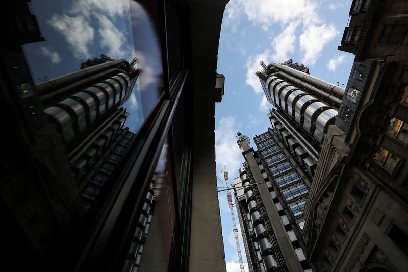 &copy; Reuters. FILE PHOTO: The Lloyd's of London building is reflected in a window in the City of London financial district in London, Britain, February 1, 2018. REUTERS/Simon Dawson