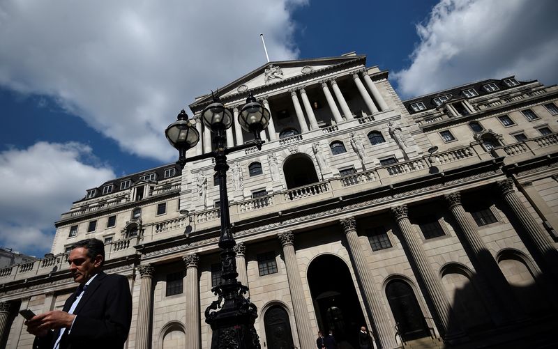 &copy; Reuters. FILE PHOTO: A man stands outside the Bank of England in the City of London, Britain April 19, 2017. Sterling basked in the glow of a six-month high following Tuesday's surprise news of a snap UK election. REUTERS/Hannah McKay