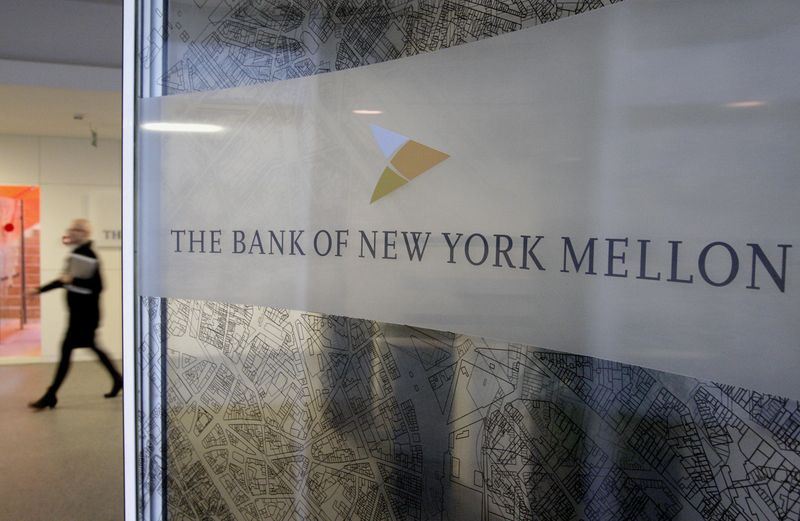 &copy; Reuters. FILE PHOTO: A woman walks past a logo at the office of the Bank of New York Mellon in Brussels, February 25, 2010. BNY Mellon Corp, the world's largest custodian of financial assets, announced the loss of 199 jobs in Belgium out of 875. REUTERS/Sebastien 