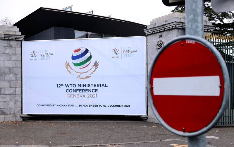 &copy; Reuters. FILE PHOTO: A sign of the 12th Ministerial Conference (MC12) is pictured at the World Trade Organization (WTO) headquarters in Geneva, Switzerland, November 25, 2021. REUTERS/Denis Balibouse