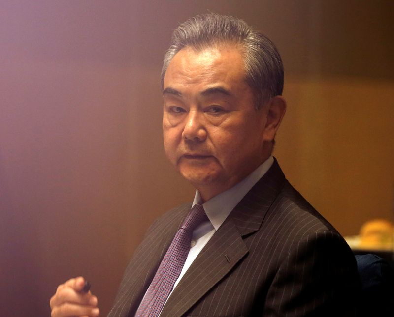 &copy; Reuters. FILE PHOTO: China's Foreign Minister Wang Yi listens during a meeting in Manila, Philippines January 16, 2021. Francis Malasig/Pool via REUTERS/File Photo