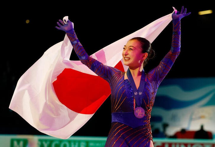 &copy; Reuters. 　フィギュアスケートの世界選手権女子シングル、北京冬季五輪で銅メダリストの坂本花織が自己最高の合計２３６．０９点で優勝を飾った（２０２２年　ロイター）