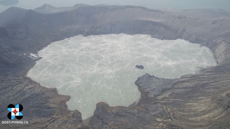 &copy; Reuters. FILE PHOTO: General view of Taal volcano's crater lake, Batangas province, Philippines July 2, 2021.  in this screen grab obtained from a social media video. Video recorded with a drone. PHIVOLCS-DOST via REUTERS 