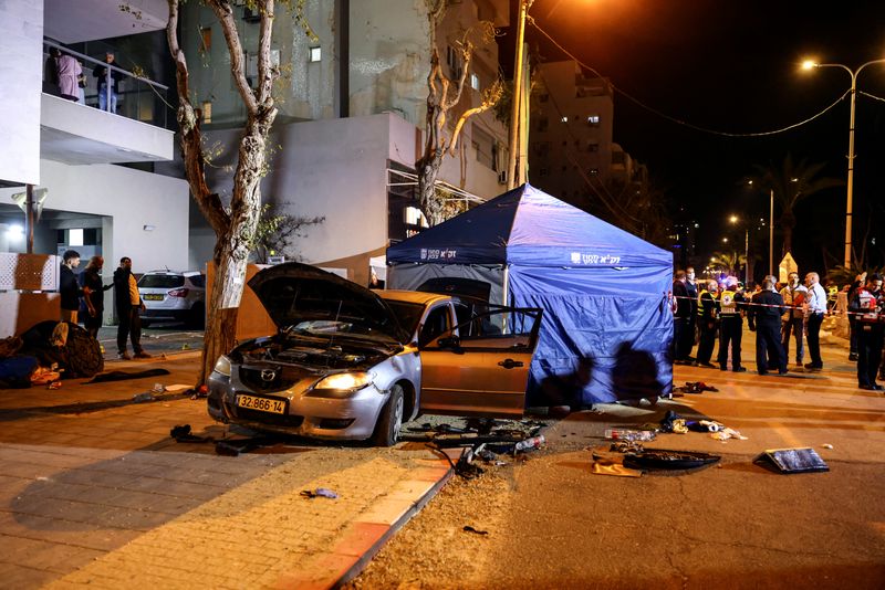 Two Arab gunmen kill two police officers in Israel and are shot dead - Israeli officials