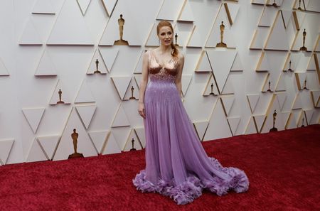 Stars bring color, glitter and some skin to Oscars red carpet