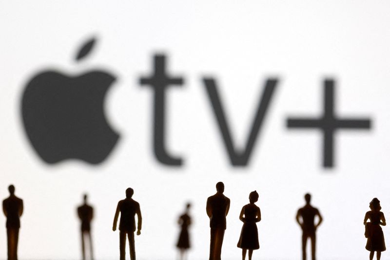 &copy; Reuters. FILE PHOTO: Toy figures of people are seen in front of the displayed Apple TV + logo, in this illustration taken January 20, 2022. REUTERS/Dado Ruvic/Illustration