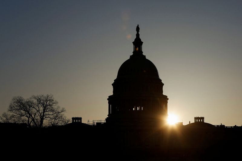 &copy; Reuters. FILE PHOTO: The sun rises behind the U.S. Capitol in the morning ahead of confirmation hearings for Supreme Court nominee Ketanji Brown Jackson on Capitol Hill in Washington, U.S. March 21, 2022.  REUTERS/Jonathan Ernst