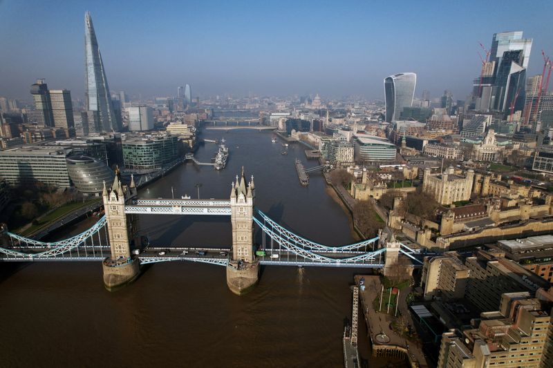 &copy; Reuters. FILE PHOTO: A general view of London showing Tower Bridge, The Shard, London City Hall, The Fenchurch Building, also known as The Walkie Talkie, The Tower Of London, St. Paul's Cathedral, in London, Britain, March 23, 2022.  Picture taken with a drone. RE