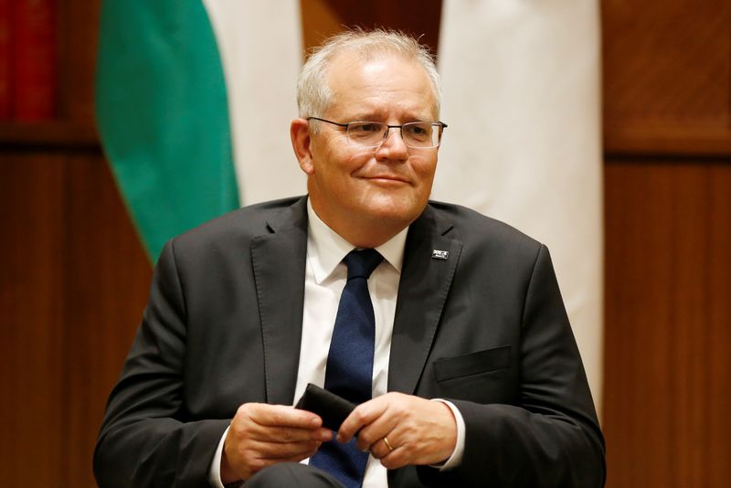 &copy; Reuters. FILE PHOTO: Australian Prime Minister Scott Morrison speaks to the media at Melbourne Commonwealth Parliament Office, in Melbourne, Australia February 11, 2022. Darrian Traynor/Pool via REUTERS/File Photo