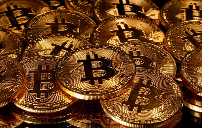 &copy; Reuters. FILE PHOTO: Representations of virtual currency Bitcoin are seen in this picture illustration taken taken March 13, 2020. REUTERS/Dado Ruvic/Illustration