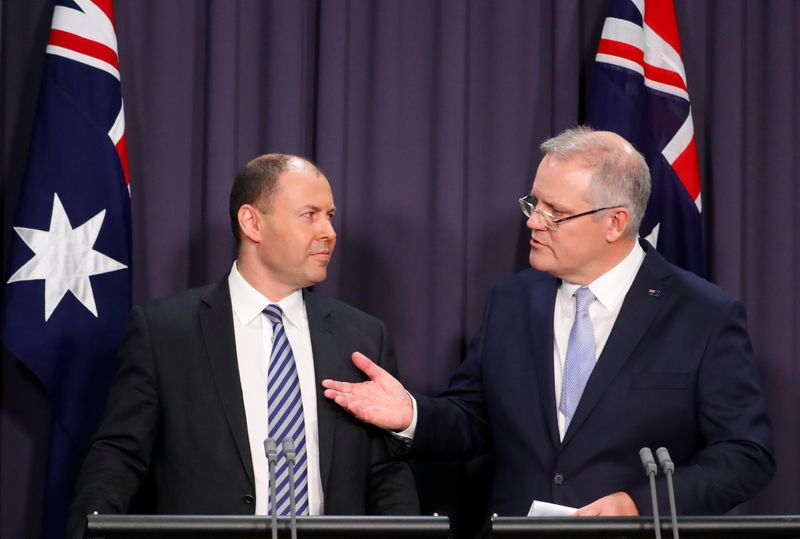 &copy; Reuters. FILE PHOTO: Australian Prime Minister Scott Morrison and Josh Frydenberg hold a news conference in Canberra, Australia August 24, 2018.   REUTERS/David Gray