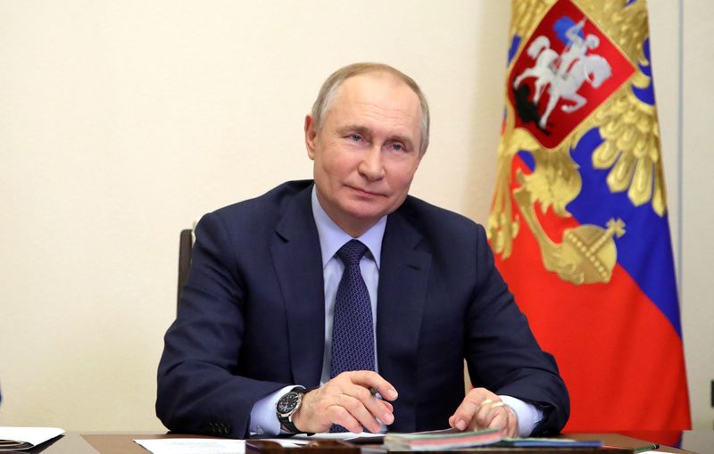&copy; Reuters. الرئيس الروسي فلاديمير بوتين في موسكو يوم 25 مارس آذار 2022. صورة لرويترز من وكالة أنباء سبوتنيك. 