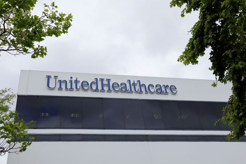 &copy; Reuters. FILE PHOTO: The corporate logo of the UnitedHealth Group appears on the side of one of their office buildings in Santa Ana, California, U.S., April 13, 2020.   REUTERS/Mike Blake