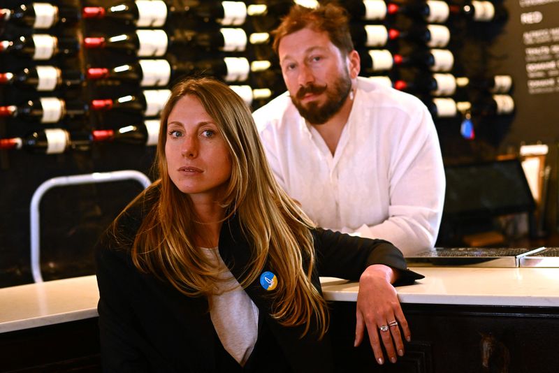 © Reuters. Tatiana Fokina and her husband Yevgeny Chichvarkin, high-profile Russian emigrants and businesspeople, are photographed in their Mayfair bar in London, Britain, March 23, 2022.  REUTERS/Dylan Martinez