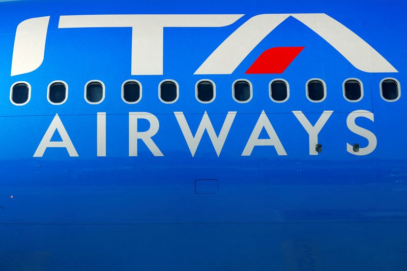 &copy; Reuters. FILE PHOTO: The logo of the new state-owned Italian carrier Italia Trasporto Aereo is seen on a plane with the new blue livery at Fiumicino airport before a news conference to present the aircraft's new fleet, in Rome, Italy, March 1, 2022. REUTERS/Remo C
