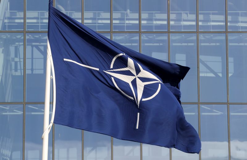 &copy; Reuters. FILE PHOTO: A NATO flag is seen at the Alliance headquarters ahead of a NATO Defence Ministers meeting, in Brussels, Belgium, October 21, 2021. REUTERS/Pascal Rossignol/File Photo
