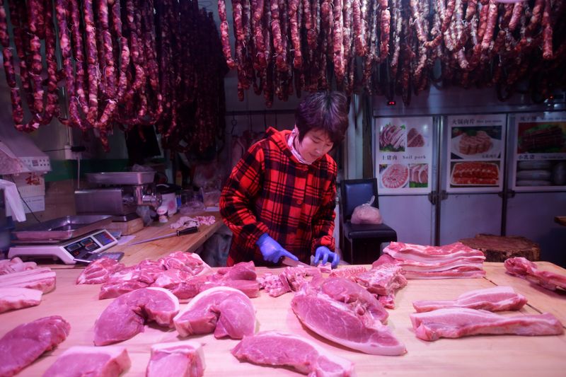 © Reuters. Carnes em mercado em Pequim, na China
REUTERS/Jason Lee