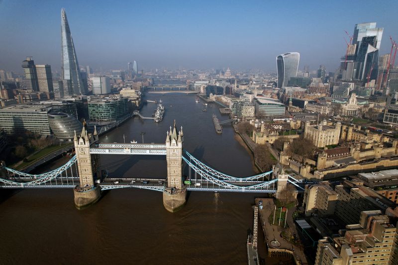 &copy; Reuters. FILE PHOTO: A general view of London showing Tower Bridge, The Shard, London City Hall, The Fenchurch Building, also known as The Walkie Talkie, The Tower Of London, St. Paul's Cathedral, in London, Britain, March 23, 2022.  Picture taken with a drone.  R