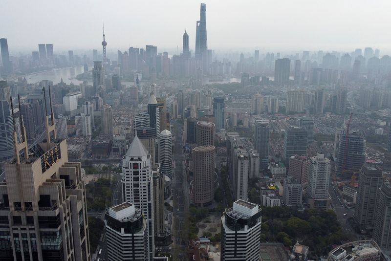 Shanghai COVID curbs prompt half of US firms in China to cut revenue forecasts - survey