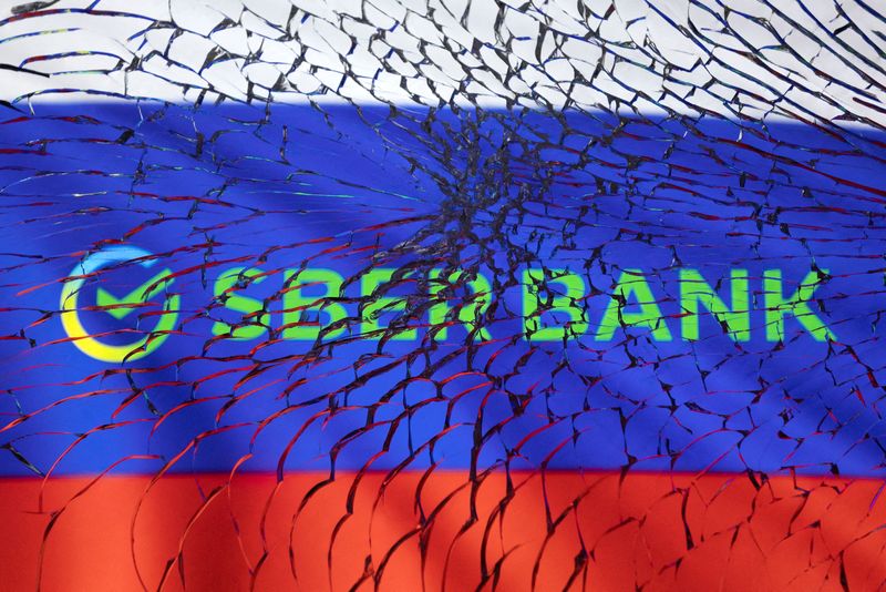 &copy; Reuters. FILE PHOTO: Sberbank logo and Russian flag are seen through broken glass in this illustration taken March 1, 2022. REUTERS/Dado Ruvic/Illustration