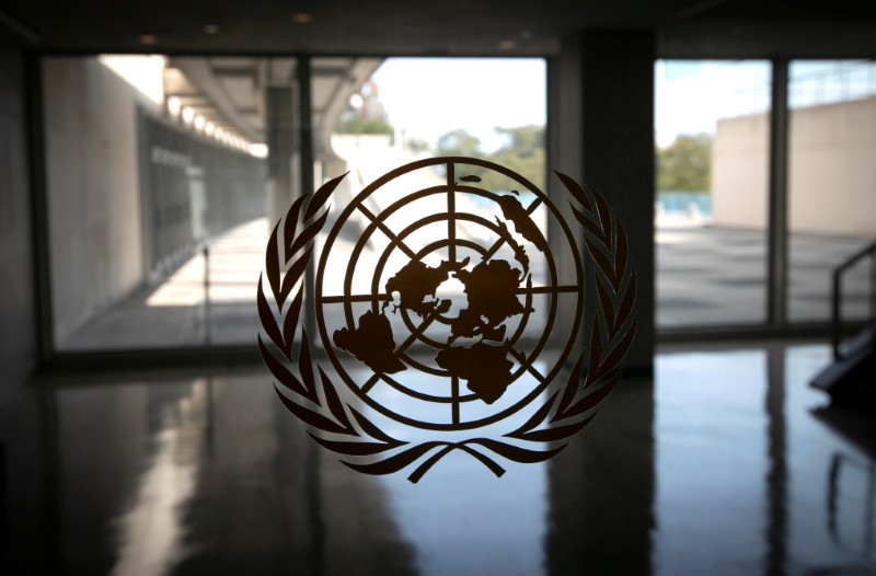 &copy; Reuters. FILE PHOTO: The United Nations logo is seen on a window in an empty hallway at United Nations headquarters during the 75th annual U.N. General Assembly high-level debate in New York, U.S., September 21, 2020. REUTERS/Mike Segar/File Photo