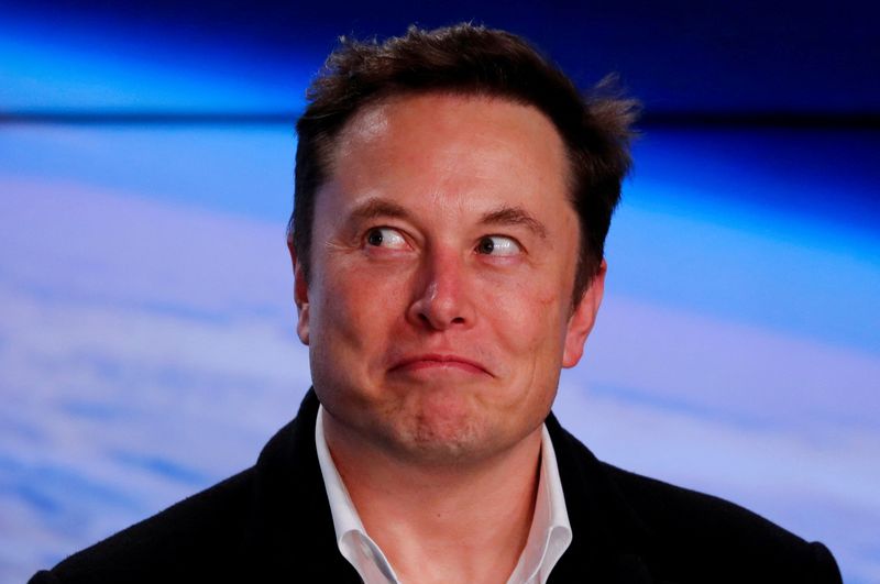 &copy; Reuters. FILE PHOTO: SpaceX founder Elon Musk reacts at a post-launch news conference after the SpaceX Falcon 9 rocket, carrying the Crew Dragon spacecraft, lifted off on an uncrewed test flight to the International Space Station from the Kennedy Space Center in C