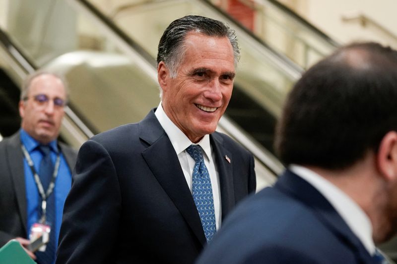 &copy; Reuters. FILE PHOTO: U.S. Senator Mitt Romney (R-UT) walks through the Senate Subway on his way to a security briefing for senators on Russia’s invasion of Ukraine, on Capitol Hill in Washington, U.S., March 30, 2022. REUTERS/Elizabeth Frantz