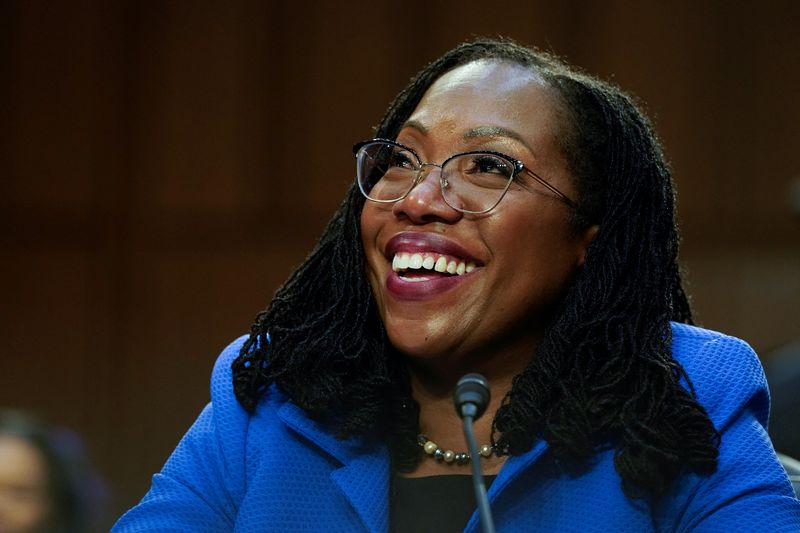 &copy; Reuters. FILE PHOTO: Judge Ketanji Brown Jackson listens to U.S. Senator Cory Booker (D-NJ) speak on the third day of the U.S. Senate Judiciary Committee confirmation hearings on her nomination to the U.S. Supreme Court, on Capitol Hill in Washington, U.S., March 