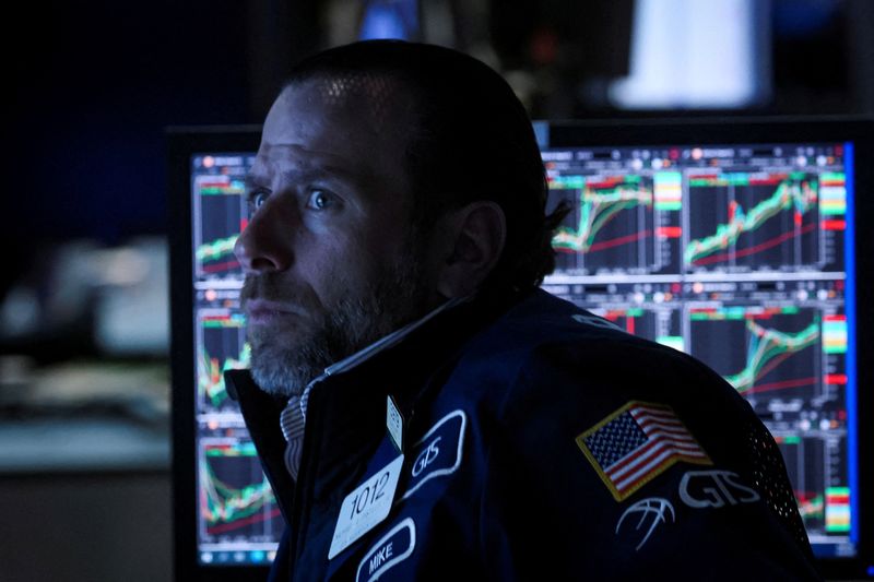 &copy; Reuters. FILE PHOTO: A trader works on the floor of the New York Stock Exchange (NYSE) in New York City, U.S., March 30, 2022.  REUTERS/Brendan McDermid