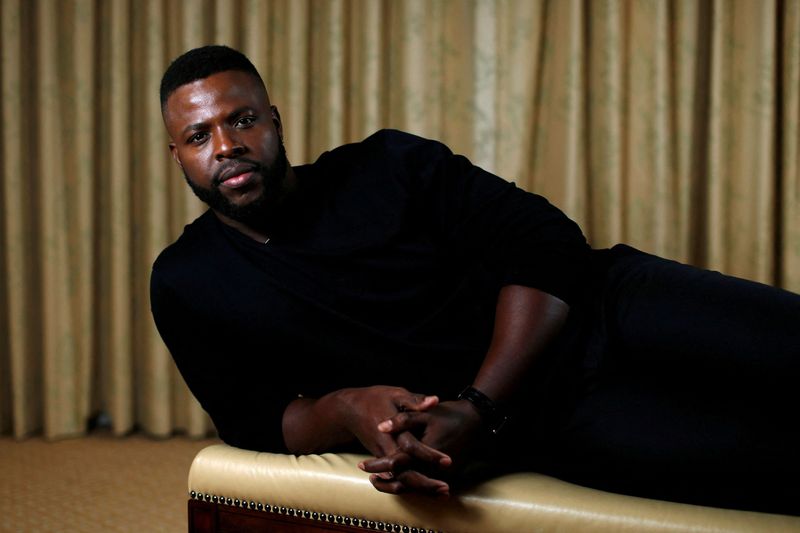 &copy; Reuters. FILE PHOTO: Cast member Winston Duke poses for a portrait while promoting the movie "Black Panther" in Beverly Hills, California, U.S., January 30, 2018. Picture taken January 30, 2018. REUTERS/Mario Anzuoni/File Photo