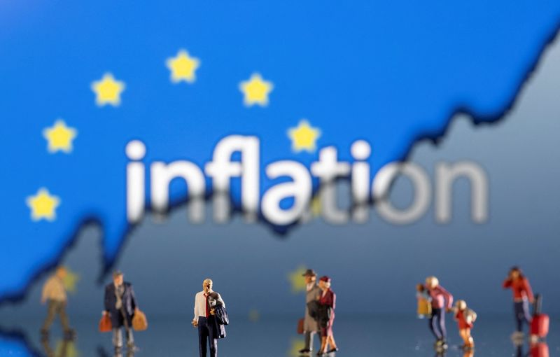&copy; Reuters. Ilustração mostra bonecos na frente da palavra "inflação", da bandeira da UE e de um gráfico de ações
11/02/2022. REUTERS/Dado Ruvic/Ilustration