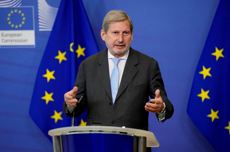 &copy; Reuters. FILE PHOTO: European Commissioner for Budget and Administration Johannes Hahn speaks during a news conference at the EU headquarters in Brussels, Belgium December 22, 2021. Virginia Mayo/Pool via REUTERS/File Photo