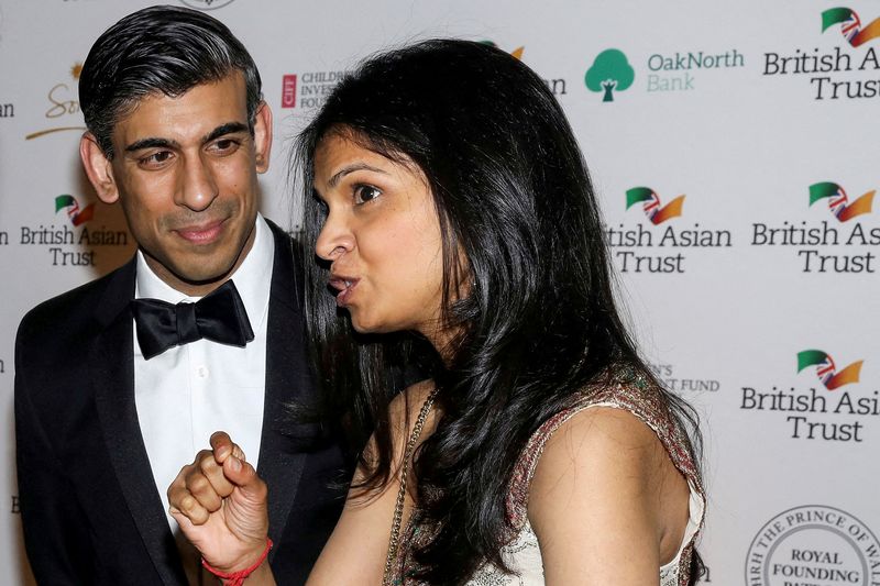 &copy; Reuters. FILE PHOTO: British Chancellor of the Exchequer Rishi Sunak and his wife Akshata Murthy attend a reception to celebrate the British Asian Trust, at The British Museum, in London, Britain, February 9, 2022. Tristan Fewings/Pool via REUTERS