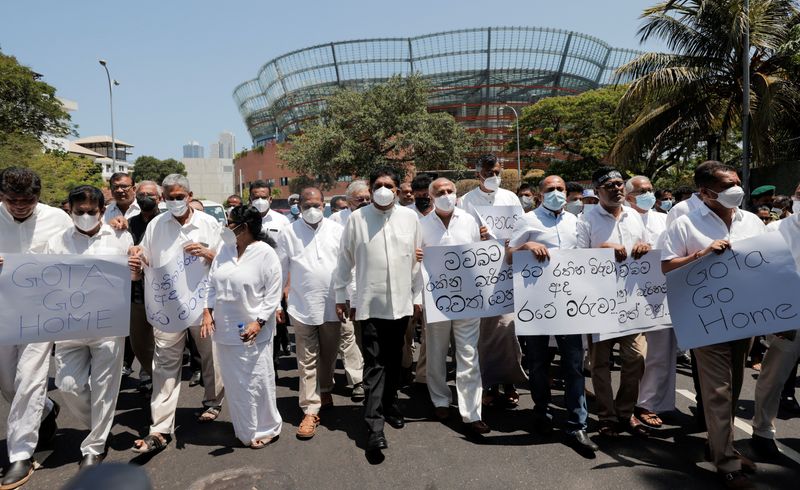 &copy; Reuters. FILE PHOTO: Sajith Premadasa, leader of the opposition alliance, Samagi Jana Balawegaya, marches along with other opposition lawmakers towards Independence Square as they shout slogans against President Gotabaya Rajapaksa after the government imposed a cu