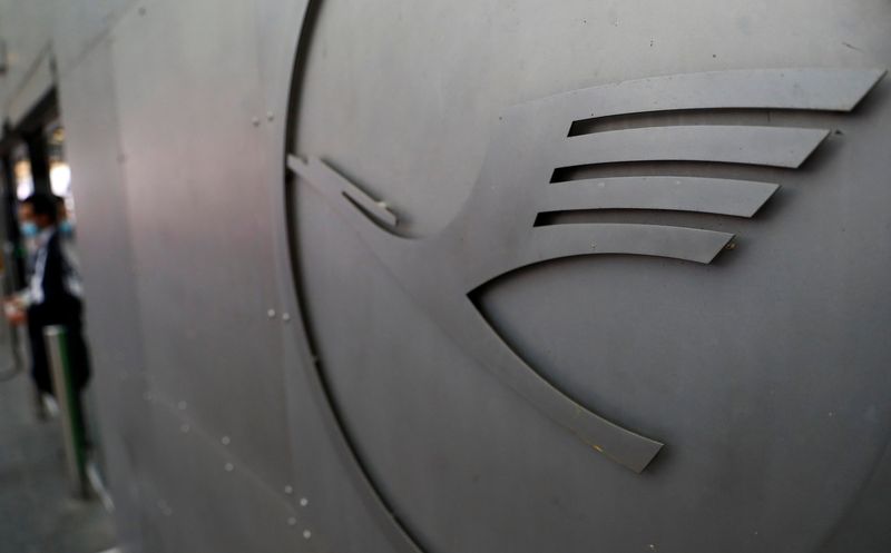 &copy; Reuters. German air carrier Lufthansa's logo is seen near a terminal on the day of the airline's annual general meeting at the airport in Frankfurt, Germany, May 4, 2021.  REUTERS/Kai Pfaffenbach