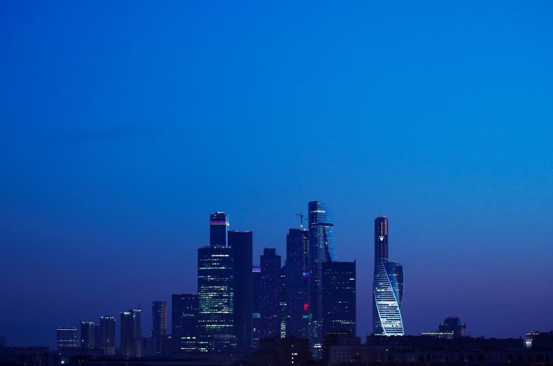 &copy; Reuters. The skyscrapers of the Moscow International Business Centre, also known as "Moskva-City", are seen before sunrise in Moscow, Russia, July 12, 2018. As well as shooting all the matches, Reuters photographers are producing pictures showing their own quirky 