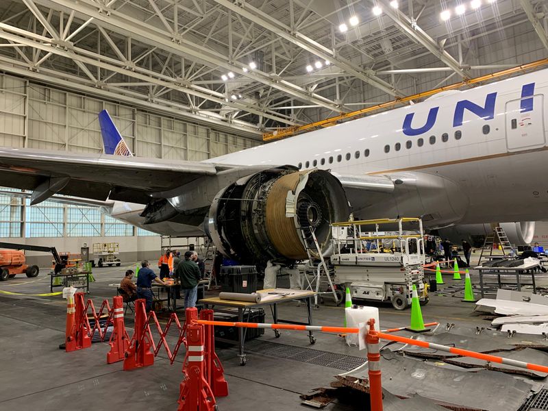 &copy; Reuters. FILE PHOTO: The damaged starboard engine of United Airlines flight 328, a Boeing 777-200, is seen following a Feb. 20 engine failure incident, in a hangar at Denver International Airport in Denver, Colorado, U.S. February 22, 2021. National Transportation