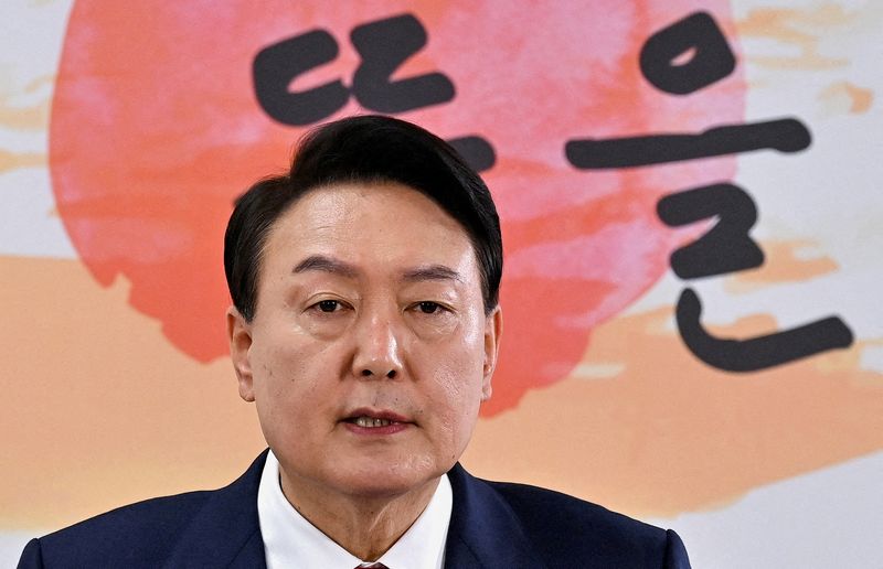 © Reuters. FILE PHOTO: South Korea's president-elect Yoon Suk-yeol speaks during a news conference to address his relocation plans of the presidential office, at his transition team office, in Seoul, South Korea, March 20, 2022.Jung Yeon-je/Pool via REUTERS/File Photo