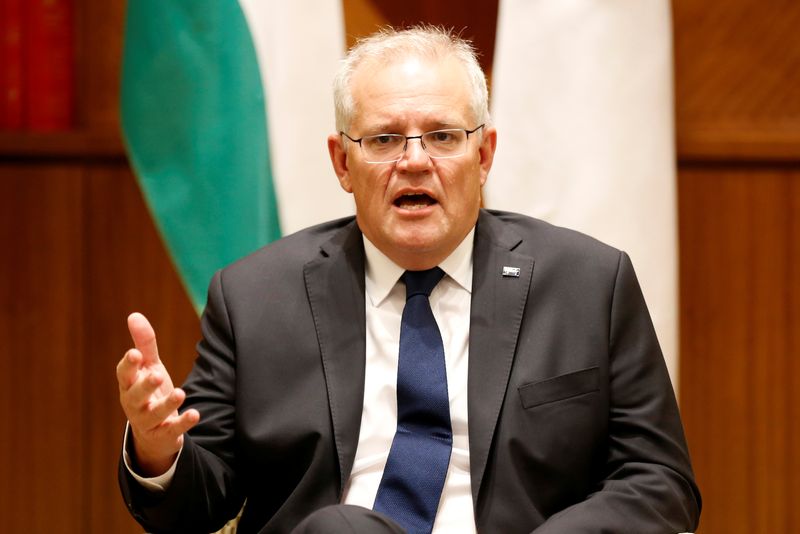 &copy; Reuters. FILE PHOTO: Australian Prime Minister Scott Morrison speaks to the media at Melbourne Commonwealth Parliament Office, in Melbourne, Australia February 11, 2022. Darrian Traynor/Pool via REUTERS