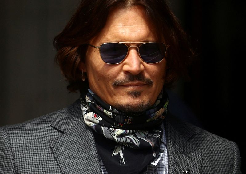 &copy; Reuters. FILE PHOTO: Actor Johnny Depp arrives at the High Court in London, Britain July 23, 2020. REUTERS/Hannah McKay