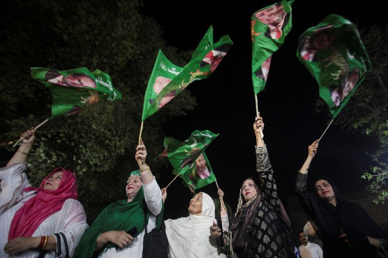 &copy; Reuters. Supporters of the Pakistan Muslim League-Nawaz (PML-N) wave flags as they celebrate after Shehbaz Sharif was sworn in as the country's prime minister, in Lahore, Pakistan April 11, 2022. REUTERS/Mohsin Raza