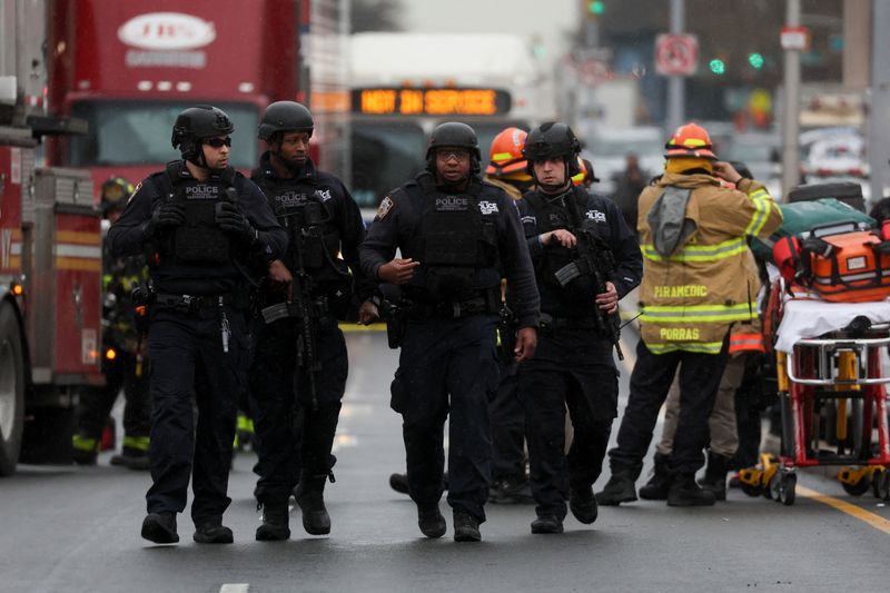 Gunman shoots 10 in New York subway after setting off smoke bomb, manhunt under way