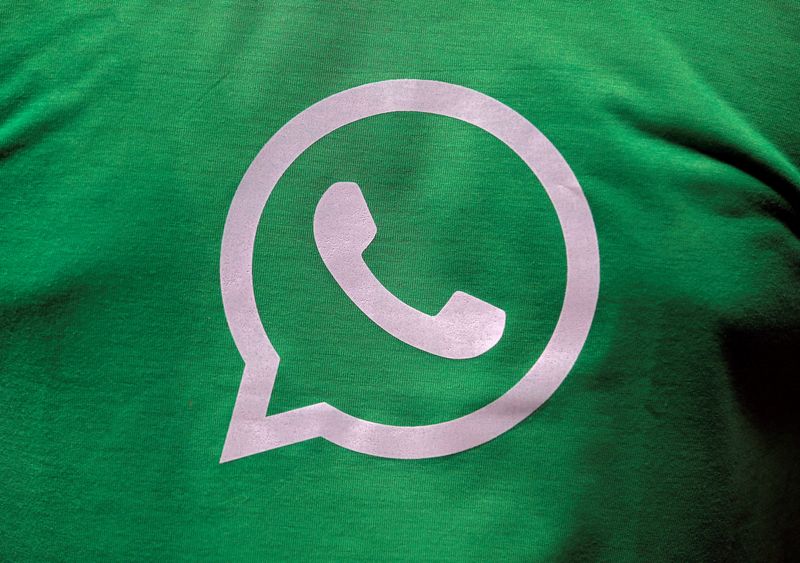 &copy; Reuters. FILE PHOTO: A logo of WhatsApp is pictured on a T-shirt worn by a WhatsApp-Reliance Jio representative during a drive by the two companies to educate users, on the outskirts of Kolkata, India, October 9, 2018.  REUTERS/Rupak De Chowdhuri/File Photo